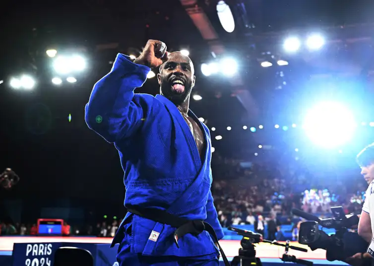 Paris 2024 Olympics - Judo - Mixed Team Final - Champ de Mars Arena, Paris, France - August 03, 2024. Teddy Riner of France reacts after they won their match against Japan. REUTERS/Arlette Bashizi     TPX IMAGES OF THE DAY